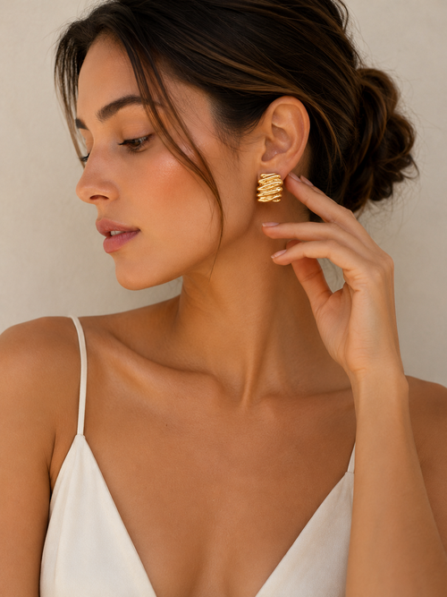 BOUCLES D'OREILLES SCULPTURALES