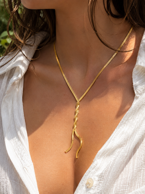 COLLIER LONG NŒUD DORÉ