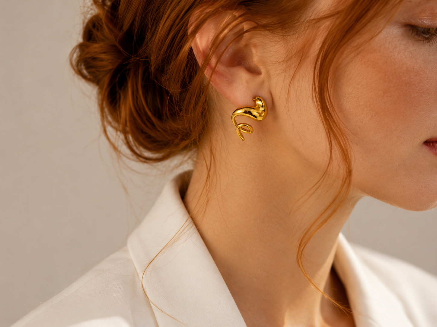 BOUCLES D'OREILLES SCULPTURALES FLUIDES